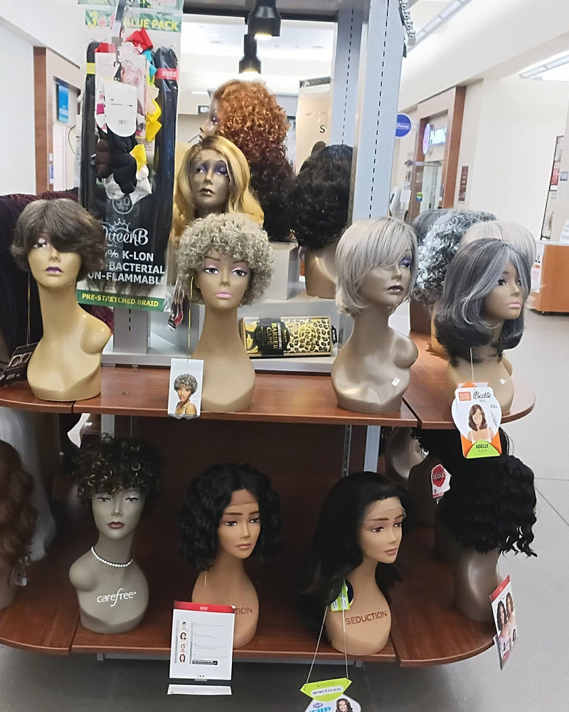 Wig display at Adele's Beauty Supply kiosk