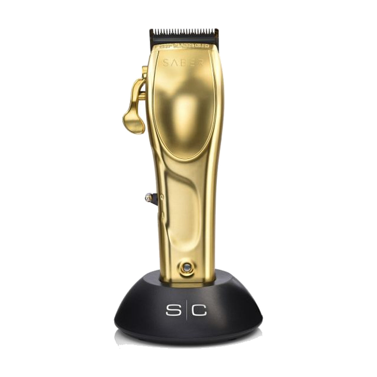StyleCraft Saber professional clipper, gold, on charging stand